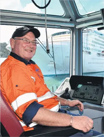  ?? STAFF REPORTER
PHOTO: PETER MCINTOSH ?? Where’s the steering wheel . . . Port Otago general boat operator Michael Kestila on the bridge of the tugboat Taiaroa ,at Port Chalmers.