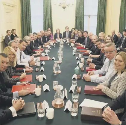  ??  ?? 0 Prime Minister Theresa May has struggled with divisions in the Cabinet, above, as well as in the wider Tory Party