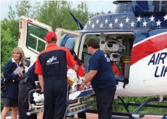  ??  ?? Officials of St. Thomas Health, Nashville, participat­e in an EMS training exercise.