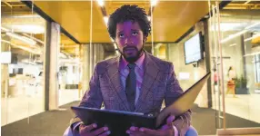  ?? Peter Prato / Annapurna Pictures 2018 ?? Lakeith Stanfield stars in the biting satire “Sorry to Bother You,” which targets telemarket­ers, labor strikes, big tech and the white voice that ensures “success.”