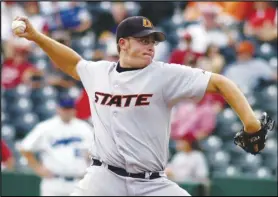  ?? Associated Press ?? Oklahoma State’s Oliver Odle pitches in the ninth inning in an NCAA regional baseball tournament game, June 1, 2007, in Fayettevil­le, Ark. Major League Baseball agreed to pay minor leaguers $185 million to settle a federal lawsuit alleging violations of minimum wage laws, a case that progressed through the courts for eight years without reaching a trial. The suit was filed in 2014 by Odle and two other players.