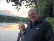  ?? PHOTO COURTESY THE SELLECK FAMILY ?? Friends and colleagues of the late Bruce Selleck, longtime Colgate professor, are raising funds to establish the Selleck Sugaring Project at Rogers Center. Selleck is pictured here with his grandson, Cooper James Murphy.