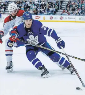  ?? RICK MADONIK TORONTO STAR FILE PHOTO ?? Toronto Forward William Nylander, right, who’s hoping to negotiate a long-term contract, may not report to the Maple Leafs training camp Thursday.