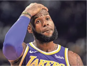  ?? JUSTIN FORD/USA TODAY ?? LeBron James reacts during Monday’s 110-105 loss to the Grizzlies (24-38) that left the Lakers 29-31 and 11th in the Western Conference.