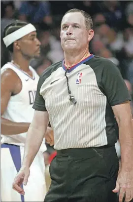  ?? Luis Sinco Los Angeles Times ?? NBA REFEREE Matt Boland, 53, served in the Connecticu­t National Guard, as did his father and brother. “It’s nice to be recognized,” he says of Veterans Day.