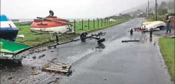  ??  ?? Corrie residents rapidly sprang into action and cleared the road of debris and returned the boats to the Quay.