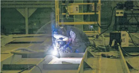  ?? FILE PHOTO ?? A worker welds steel into place while working on what will be the polar vessel Max Bernays, in the Assembly Hall at the Irving Shipyard in Halifax in late 2019.