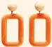  ??  ?? Orange resin earrings, £12.99 (mango.com)