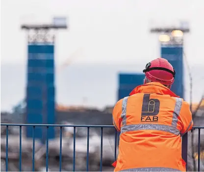  ??  ?? A worker at BiFab in Methil, which produces equipment for the offshore oil and gas industry.