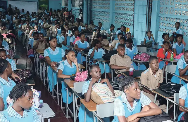  ??  ?? Lacovia High School students listen to Founder and Creative Director of Sankofa Arts & Facilitati­on, Fabian Thomas (not pictured), speak about the importance of employing refusal skills as one of the lessons learnt from ‘The Movement’, a live...