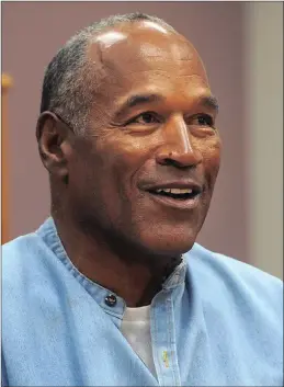  ??  ?? OJ Simpson appears via video for his parole hearing at the Lovelock Correction­al Centre in Lovelock, Nevada, on Thursday. Simpson was granted parole after more than eight years in prison for a Las Vegas hotel heist, successful­ly making his case in a...
