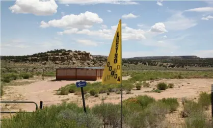  ?? ?? A protest sign saying ‘No Mining’ in Navajo is seen next to the entry to Northeast Church Rock abandoned uranium mine in Pinedale, New Mexico. Photograph: Pamela Peters/Reuters