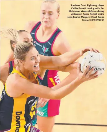  ?? Picture: SCOTT BARBOUR ?? Sunshine Coast Lightning player Caitlin Bassett dealing with the Melbourne Vixens defence during yesterday’s Super Netball major semi-final at Margaret Court Arena