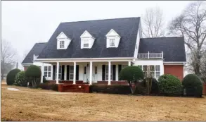  ?? PHOTOS BY LINDA GARNER-BUNCH/Arkansas Democrat-Gazette ?? Inside this two-story home are four bedrooms, three-and-a-half baths and   owing living spaces. The fourth bedroom could be used as a media/game room or guest quarters.