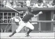  ?? NWA Democrat-Gazette/BEN GOFF • @NWABENGOFF ?? Naturals third baseman Jecksson Flores hits a line drive Wednesday against the Travelers at Arvest Ballpark in Springdale.