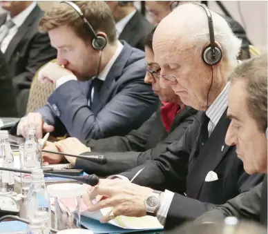  ??  ?? Staffan de Mistura, UN special envoy for Syria, and other attendees take part in the peace talks in Astana on Friday. (AFP)