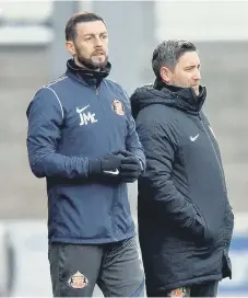  ??  ?? Sunderland head coach Lee Johnson with assistant Jamie McAllister.