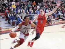  ?? JOHN BLAINE — FOR THE TRENTONIAN ?? Rider’s Stevie Jordan, left, drives to the basket defended by Fairfield’s Tyler Nelson, right, during action last season. The junior point guard was a preseason First Team AllMAAC selection.