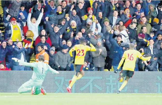  ?? AP ?? Watford’s Ismaila Sarr (centre) celebrates after scoring his side’s second goal during the English Premier League match between Watford and Liverpool at Vicarage Road stadium in Watford, England, on Saturday, February 29, 2020. Watford won 3-0.