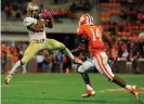  ?? Richard Shiro/AP ?? Martin Jenkins, right, played defensive back at the University of Clemson, one of the most prestigiou­s – and profitable – college football programs in America. Photograph: