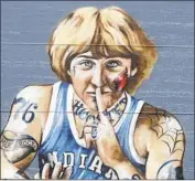  ?? Darron Cummings Associated Press ?? NBA GREAT Larry Bird doesn’t like tattoos, so a new mural on the side of a residence will be modified.