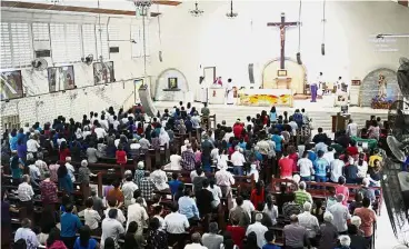  ??  ?? Full House: Catholics attending Mass to mark Ash Wednesday at the Assumption Church in Petaling Jaya.