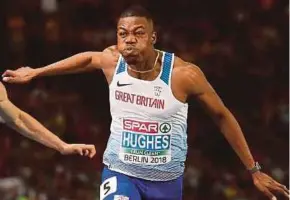  ?? PIC AFP ?? Britain’s Zharnel Hughes won gold in the 100m on Tuesday.