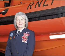  ??  ?? Porthcawl RNLI volunteer Aileen Jones has been awarded an MBE