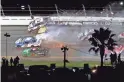  ?? MARK J. REBILAS/USA TODAY SPORTS ?? Brad Keselowski (2), Kyle Busch (18) and Austin Cindric (33) wreck during the final lap of the Daytona 500.