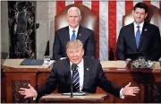  ?? Pablo Martinez Monsivais / AP ?? President Donald Trump addresses a joint session of Congress on Tuesday as Vice President Mike Pence (left) and House Speaker Paul Ryan of Wisconsin listen.