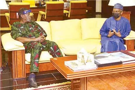  ??  ?? Kaduna State Governor Nasir El- Rufai ( right); General Overseer of the Redeemed Christian Church of God ( RCCG), Pastor Enoch Adeboye, during a courtesy visit by the cleric to Government House, Kaduna… yesterday.