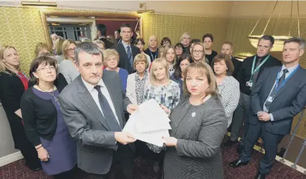  ??  ?? Sunderland headteache­rs’ union meeting over national funding crisis. From left, Dave Marshall, from the Associatio­n of Headteache­rs, and MP Sharon Hodgson.