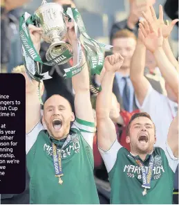  ??  ?? HIBBY MEMORIES Hibs picking up Scottish Cup after historic win at Hampden