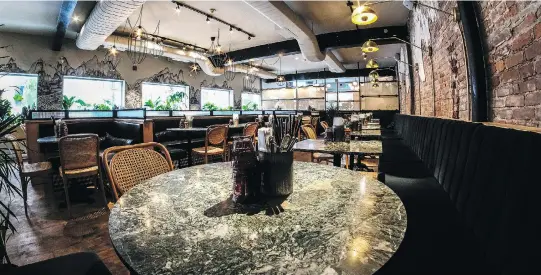  ?? PHOTOS: DAVE SIDAWAY ?? The second location of Restaurant Hà features a multi-level room, 40-seat terrasse and a cool nouveau Indochine look by designer Amlyne Philips.