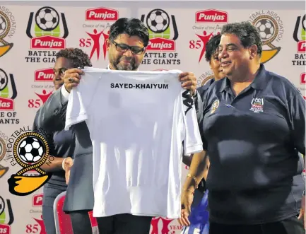  ?? Photo: Fiji FA Media ?? From left: Attorney General and Minister for Economy Aiyaz Sayed-Khaiyum receives a special shirt from Fiji Football Associatio­n president Rajesh Patel for opening the Punjas Battle of the Giants tournament at Churchill Park, Lautoka, on August 7, 2020. Sayed-Khaiyum praised Fiji FA for holding the first sporting tournament in the country during the COVID-19 pandemic period.