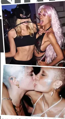  ??  ?? Out to shock: Top, Aboah in a pink wig with model Lily Donaldson. Above: Kissing Cara Delevingne