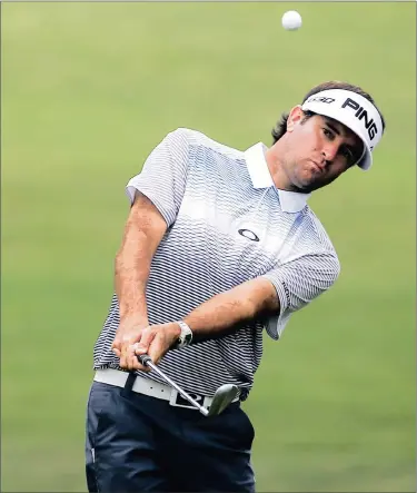  ?? PICTURE: EPA ?? BIG ASK: Bubba Watson of the US pitches onto the second green during practice for the Tour Championsh­ip at East Lake Golf Club in Atlanta, Georgia. The tour’s final event starts today with Watson and the rest of the top five in the points standings...