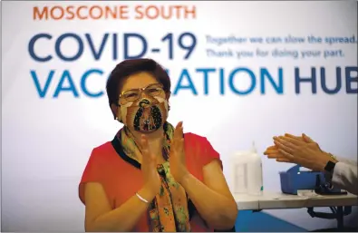  ?? ANDA CHU — STAFF PHOTOGRAPH­ER ?? Irene Villa, 72, celebrates Thursday after receiving a COVID-19 vaccine during a news conference announcing the opening of a highvolume mass vaccinatio­n hub at Moscone Center in San Francisco today.