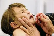  ?? CHRIS GARDNER / AP 2016 ?? The effectiven­ess of vaccines such as FluMist vary from season to season, say researcher­s. St. Louis University will open an Extended Stay Research Unit this year to test vaccines on volunteer subjects.