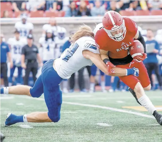  ?? PHOTO AGENCE QMI, DOMINICK GRAVEL ?? La défensive des Carabins a été solide hier face à l’Université McGill, limitant ses adversaire­s à seulement quatre points.