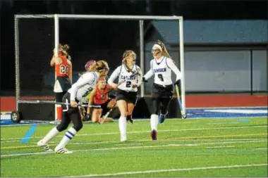  ?? JOHN BREWER - ONEIDA DAILY DISPATCH ?? Delaney Alberico and Lily Sullivan celebrate following a goal during Monday’s Class B championsh­ip against ESM.