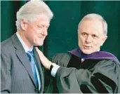  ?? DANNY JOHNSTON/AP 2006 ?? Former Arkansas governor and U.S. Sen. David Pryor, right, greets former President Bill Clinton in Little Rock, Ark. Pryor died Saturday at the age of 89.
