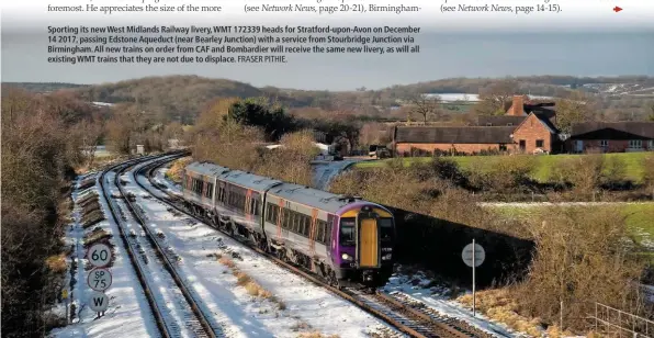  ?? FRASER PITHIE. ?? Sporting its new West Midlands Railway livery, WMT 172339 heads for Stratford-upon-Avon on December 14 2017, passing Edstone Aqueduct (near Bearley Junction) with a service from Stourbridg­e Junction via Birmingham. All new trains on order from CAF and...