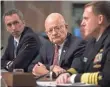  ?? JIM LO SCALZO/EPA ?? Director of National Intelligen­ce James Clapper, center, testifies Thursday on Capitol Hill.