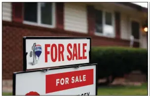  ?? AP/DAVID ZALUBOWSKI ?? A house sits on the market in early October in the north Denver suburb of Thornton. Figures released Thursday show the 30-year fixed-rate average at the highest point in nearly eight years.