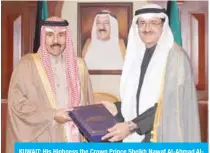  ?? — KUNA photos ?? KUWAIT: His Highness the Crown Prince Sheikh Nawaf Al-Ahmad AlJaber Al-Sabah receives Kuwait’s Counsel General in Irbil Omar AlKandari, who handed him a book of Kuwait’s humanitari­an activities in Iraq since 2015.