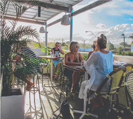  ??  ?? Trendy new restaurant­s such as The Collective have boosted the appeal of Palm Beach, which is now facing infrastruc­ture issues.