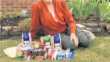  ?? Picture: Submitted ?? Carolyn Franks with some of the items she has collected for Cheltenham Foodbank