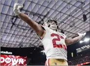  ?? GEORGE WALKER IV — THE ASSOCIATED PRESS ?? The 49ers’ Christian Mccaffrey celebrates a TD against the Chiefs during Super Bowl LVIII Sunday in Las Vegas.