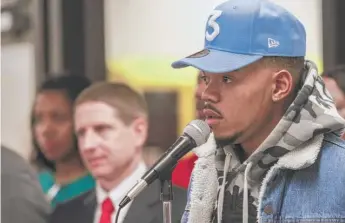  ?? | MARIA CARDONA/ SUN- TIMES ?? Chance the Rapper discusses his latest CPS donations Friday afternoon at Robeson High School in Englewood. He said he hasn’t spoken to Gov. Bruce Rauner since launching the project.